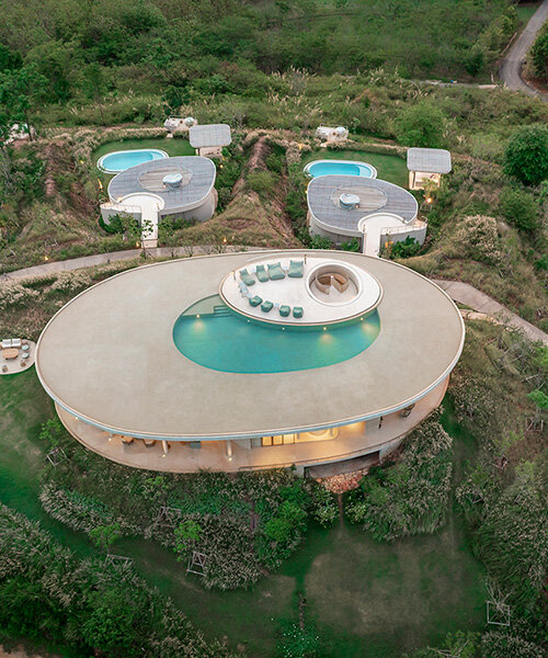 onion expands nature-inspired resort with pool villas atop thai mountains