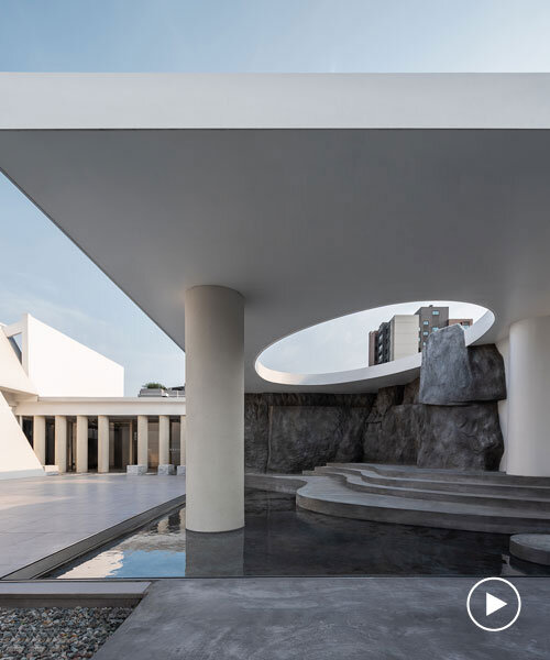 cylindrical columns and stone steps outline resoul rooftop concept store in china