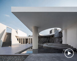 cylindrical columns and stone steps outline resoul rooftop concept store in china