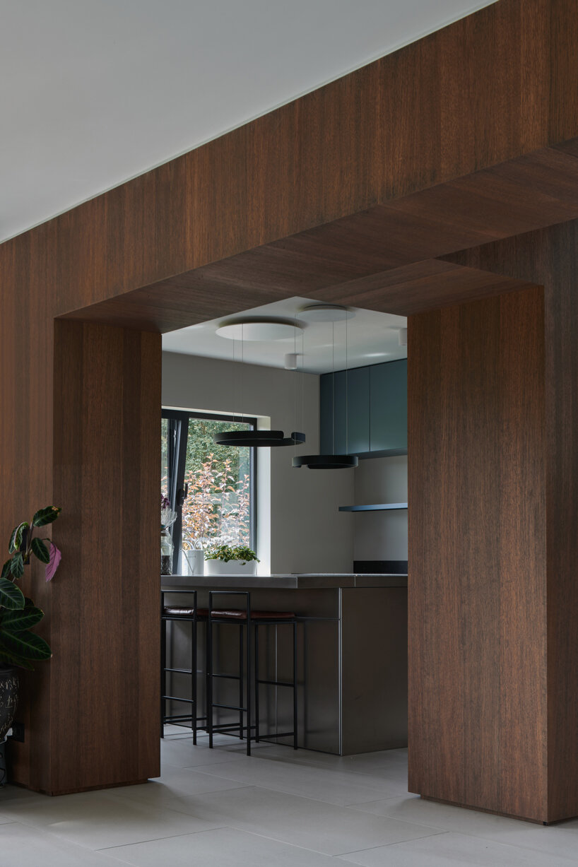 thatched-roofed boathouse addition anchors dutch villa renovation by serge schoemaker