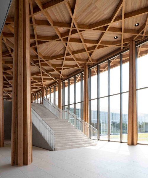 shigeru ban architects' toyota city museum illuminated with emblematic timber skylight