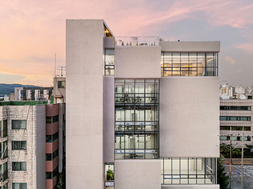 concrete and glass interplay upon kn global seoul headquarters' facade by zaira