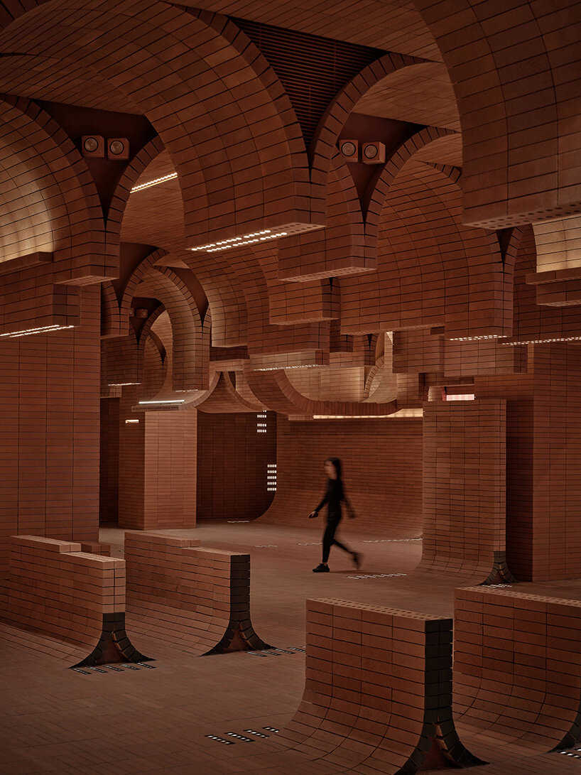 sea of undulating bricks floods chinese cinema café interiors by one plus partnership