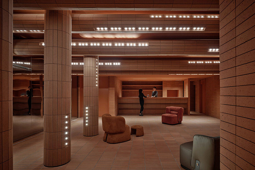 sea of undulating bricks floods chinese cinema café interiors by one plus partnership