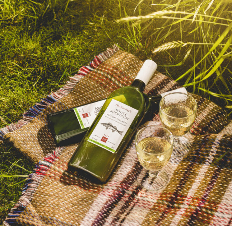 wine society recycles plastic into flatshaped bottles for chardonnay