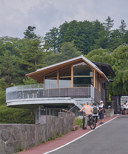 semi-circular terraces look over japanese forest park in renovation by HAGISO