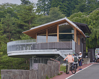 semi-circular terraces look over japanese forest park in renovation by HAGISO
