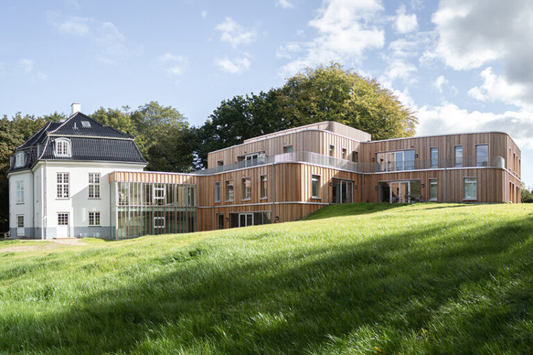 JAJA architects builds home for families in need on bagsværd lake