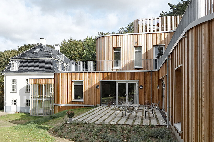 JAJA architects builds home for families in need on bagsværd lake