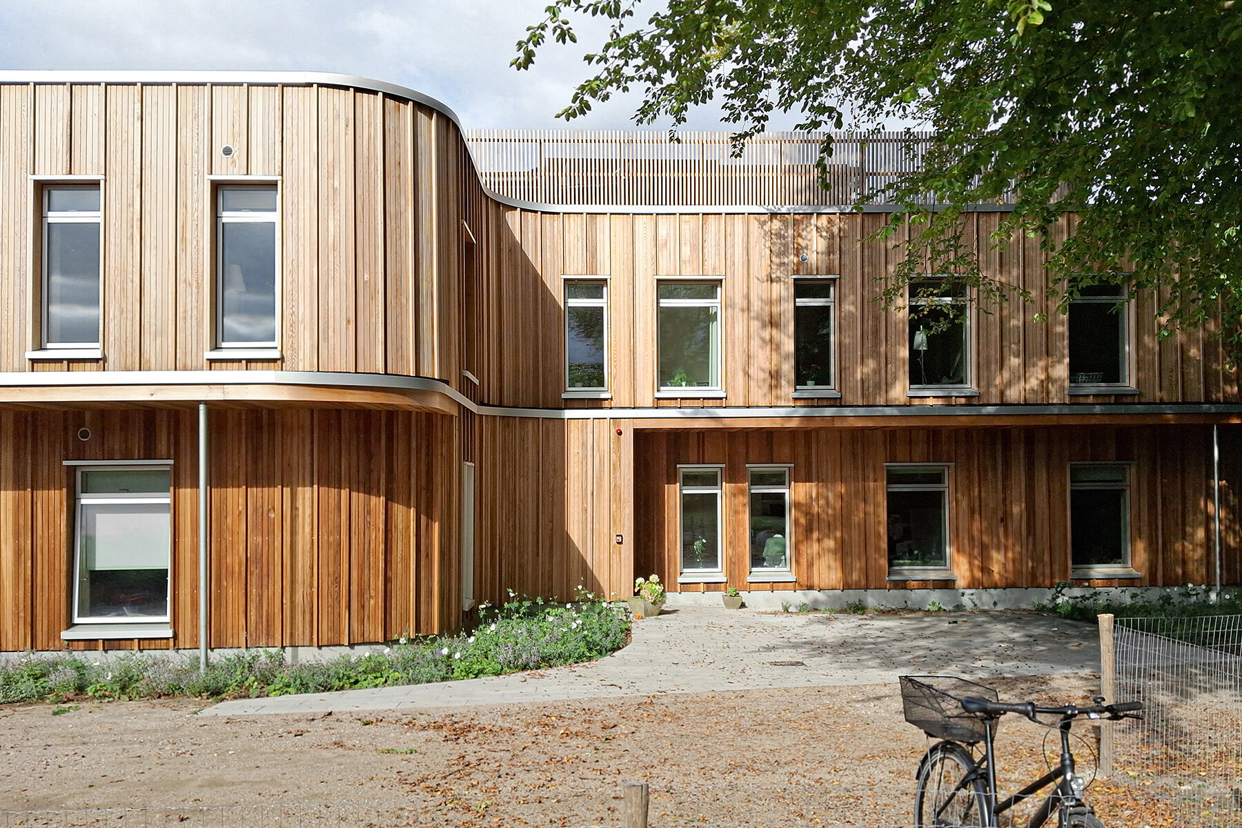 JAJA architects builds home for families in need on bagsværd lake