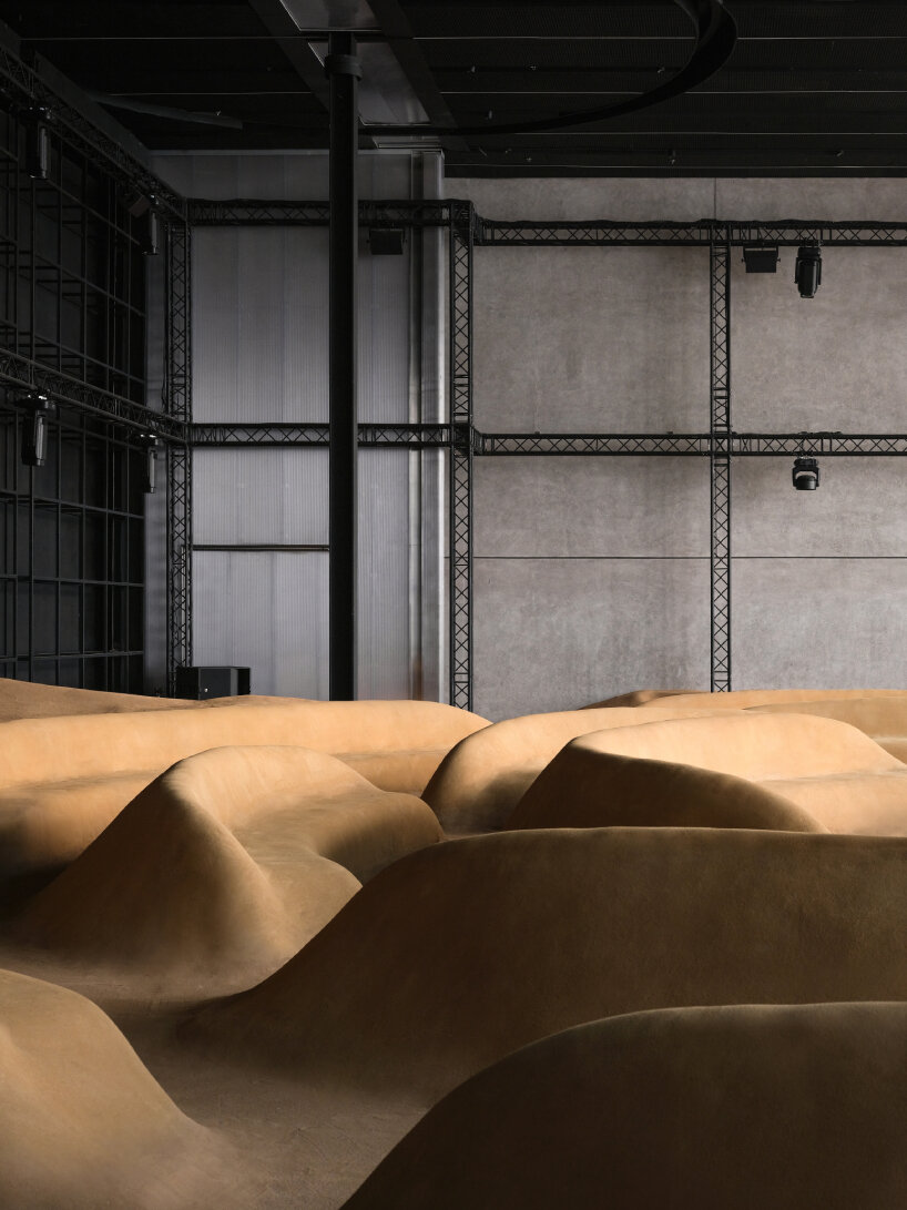 for ‘Waves’, Bottega Veneta shapes the sand-colored seats into sculptural sound ripples