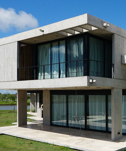 glazed openings puncture through concrete casa pevi in buenos aires