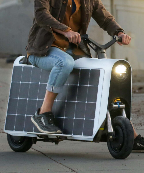 electric cargo scooter ‘lightfoot’ can fit carry-on and large grocery bags under its solar panels