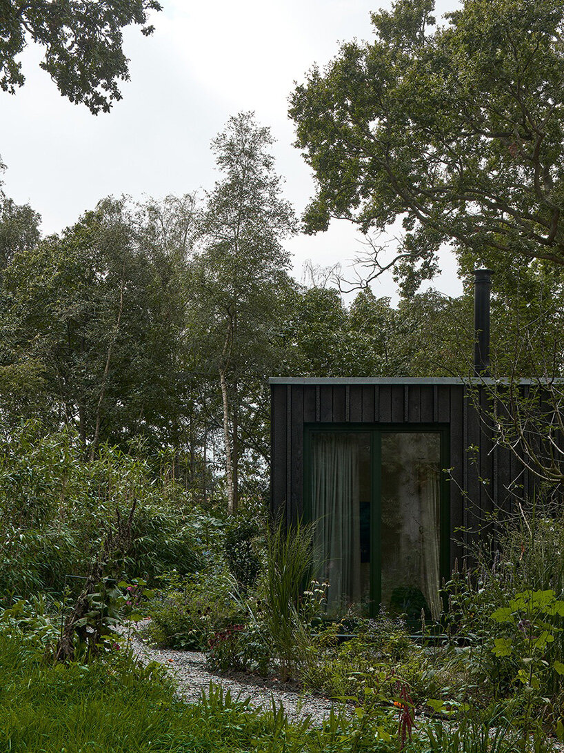 floating timber volume crowns forest house by kumiki architecture in the netherlands