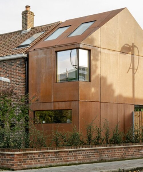 rusty corten steel extension by fluid glass modernizes 1950s brick home in london