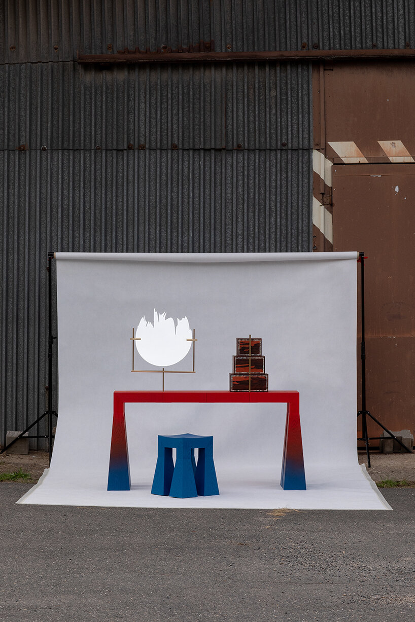 gradient finishes coat ash wood in this contemporary vanity table interpretation