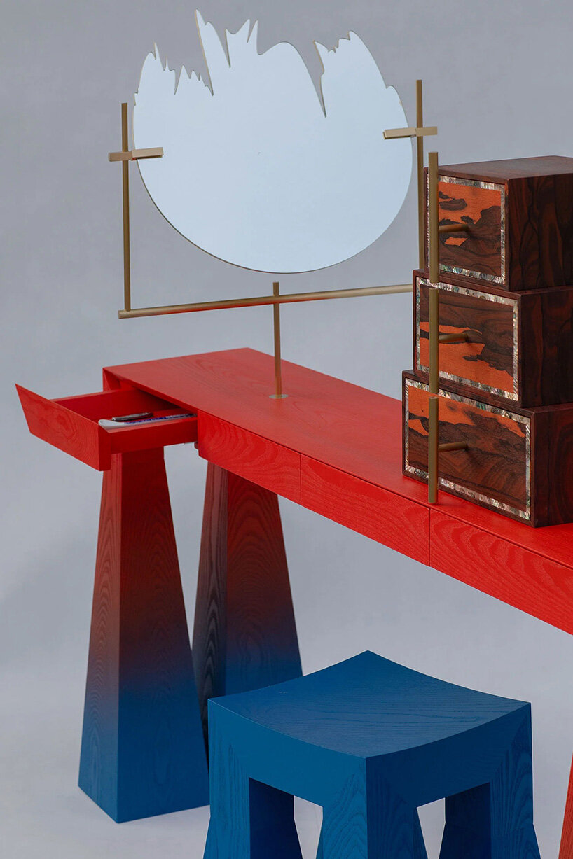 gradient finishes coat ash wood in this contemporary vanity table interpretation