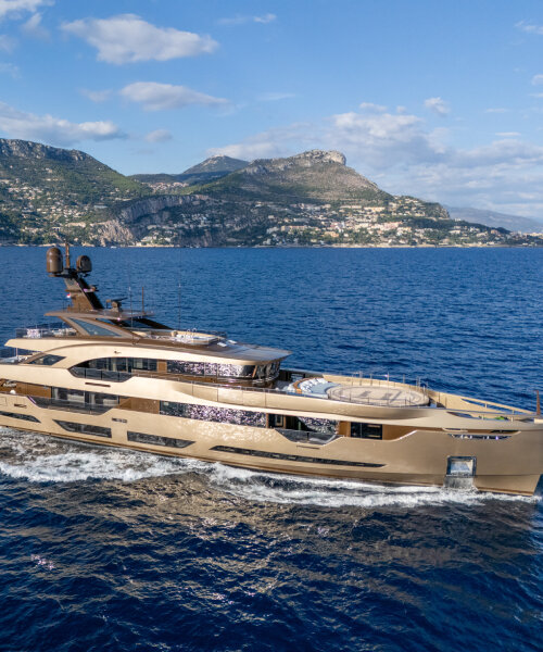 hybrid yacht ANJELIF glows in daylight with champagne-colored aluminum exterior