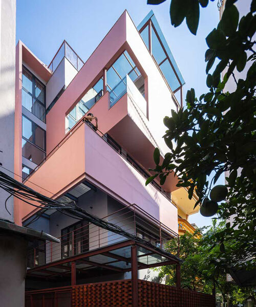 TOOB studio stacks pink open blocks reviving terraced residence in vietnam