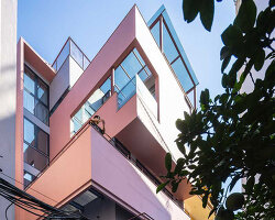 TOOB studio stacks pink open blocks reviving terraced residence in vietnam