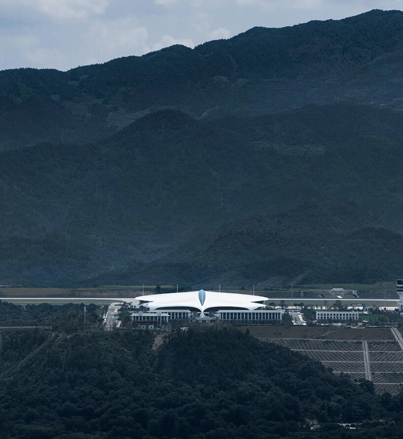 MAD's lishui airport in china officially opens beneath bird-like white roof
