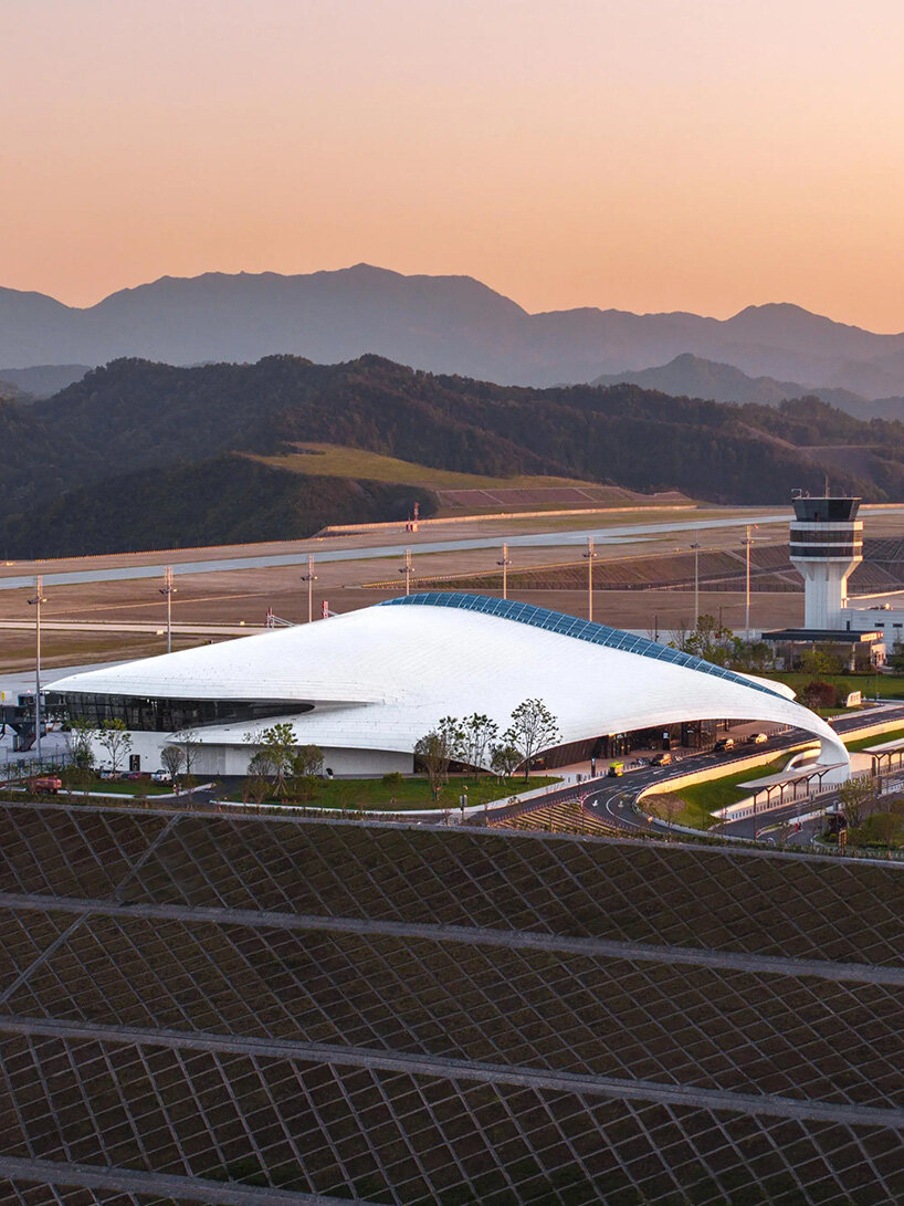 MAD's lishui airport in china officially opens beneath bird-like white roof