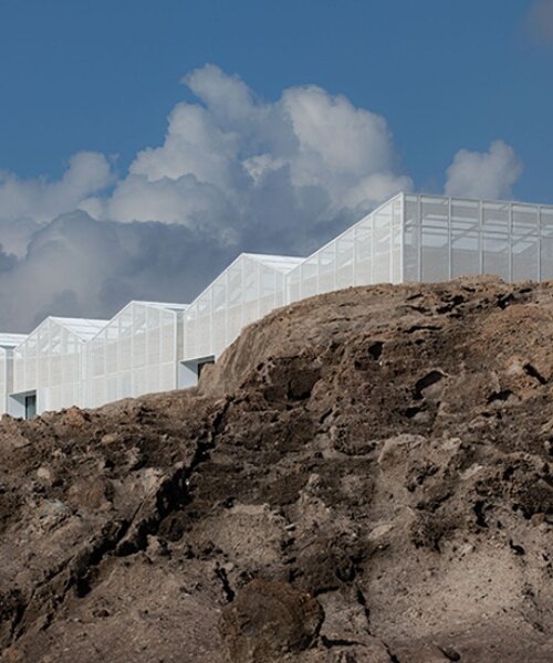 translucent metal mesh wraps MARS studio's sluice gate, echoing mountains and sea in china