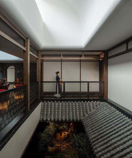 water ponds and courtyards in tanzo space's meng du hui restaurant evoke bamboo garden