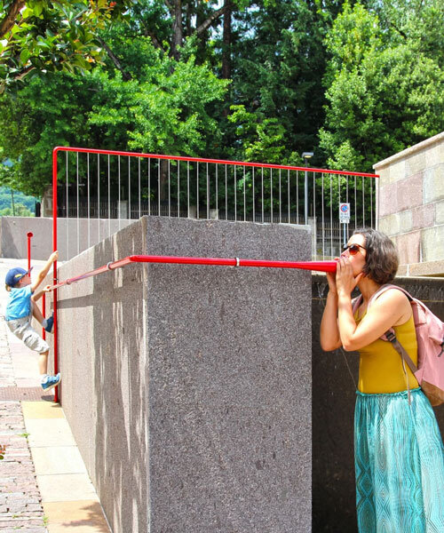 playful red tubes form moradavaga's interactive sound installation at italian fire station