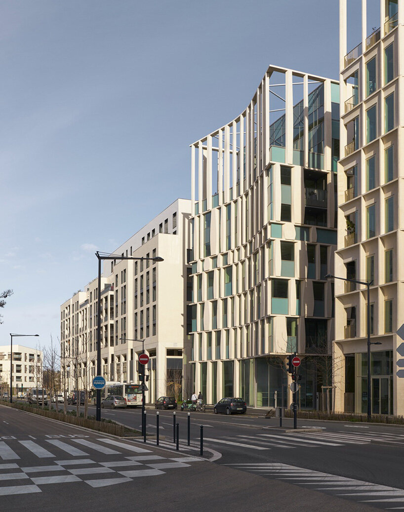 sculptural concrete columns define cino zucchi architetti’s office building in bordeaux