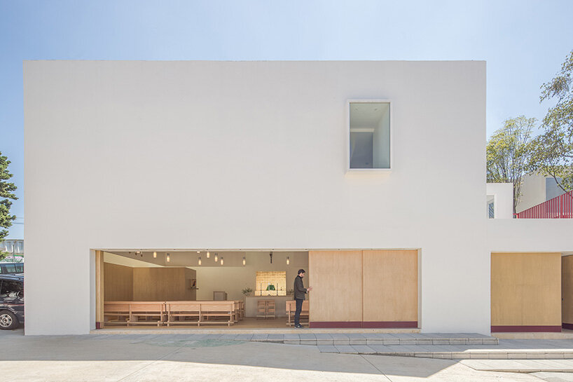 sliding doors in divine proportion front oratory by jose lombana arquitectos in mexico