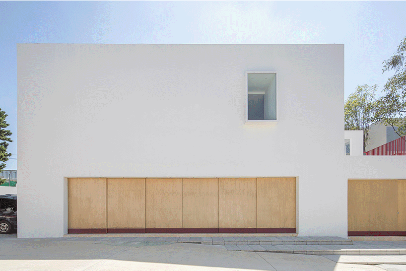 sliding doors in divine proportion front oratory by jose lombana arquitectos in mexico