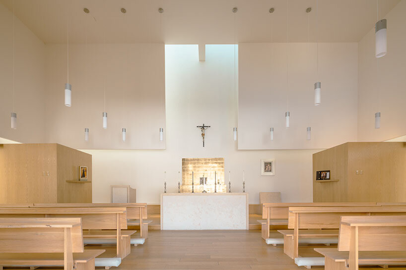 sliding doors in divine proportion front oratory by jose lombana arquitectos in mexico