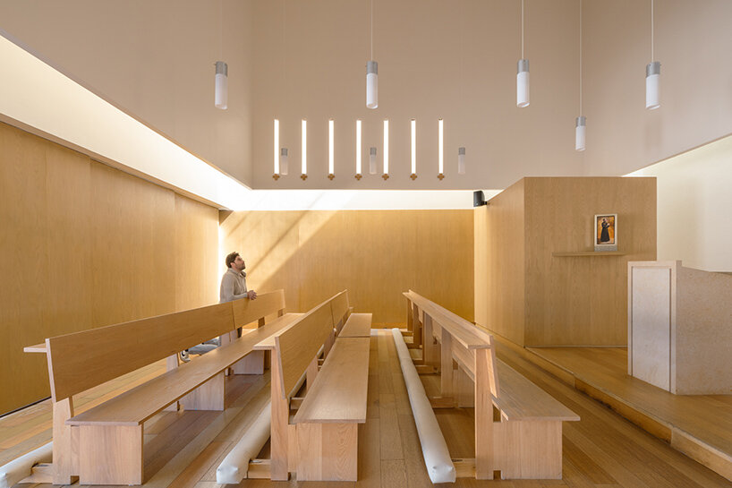 sliding doors in divine proportion front oratory by jose lombana arquitectos in mexico