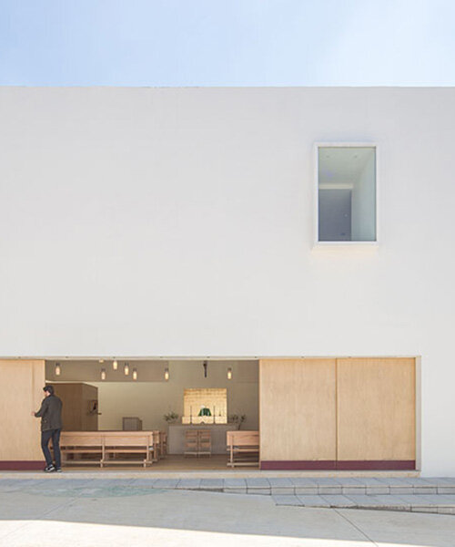 sliding doors in divine proportion front oratory by jose lombana arquitectos in mexico