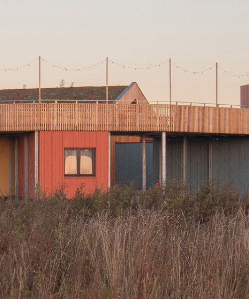 julius taminiau architects composes startup village of colorful wooden modules in germany