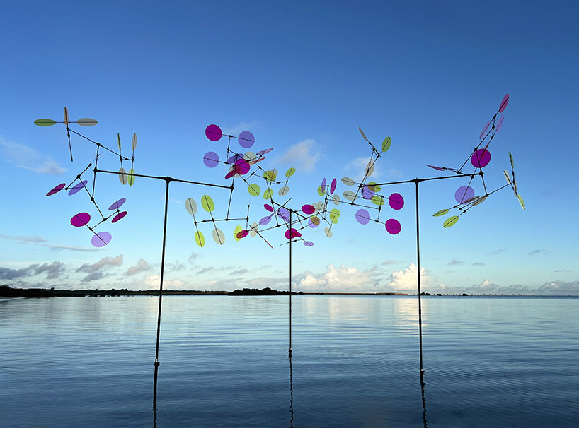 vincent leroy's multicolored installation turns japanese beach into chromatic landscape