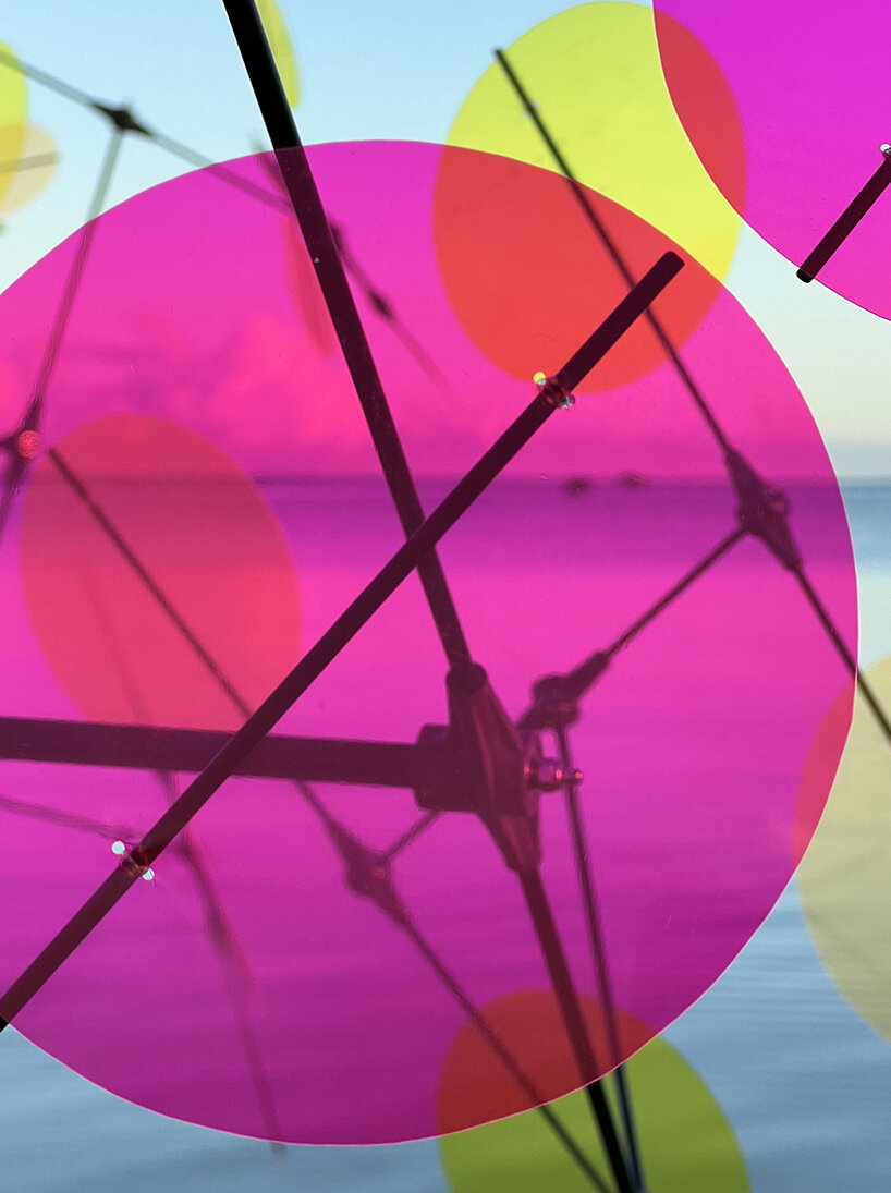 vincent leroy's multicolored installation turns japanese beach into chromatic landscape