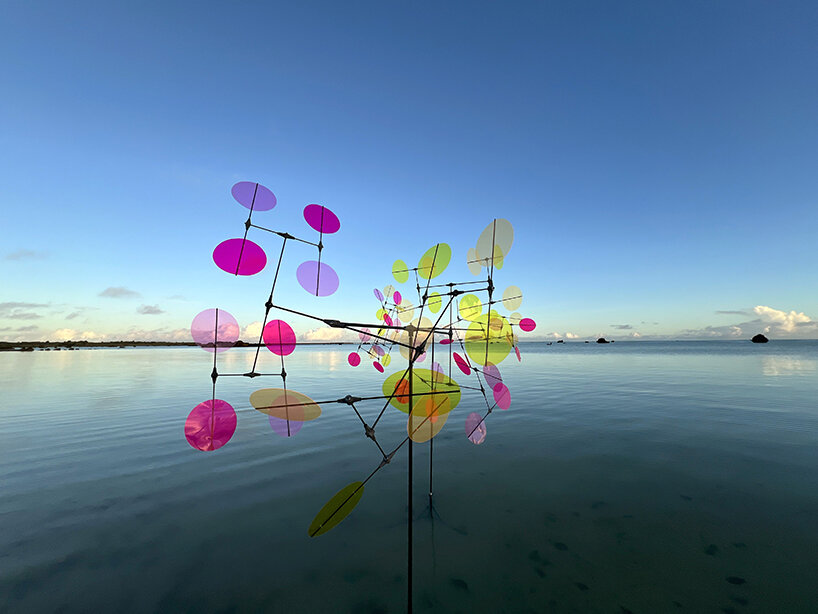 vincent leroy's multicolored installation turns japanese beach into chromatic landscape