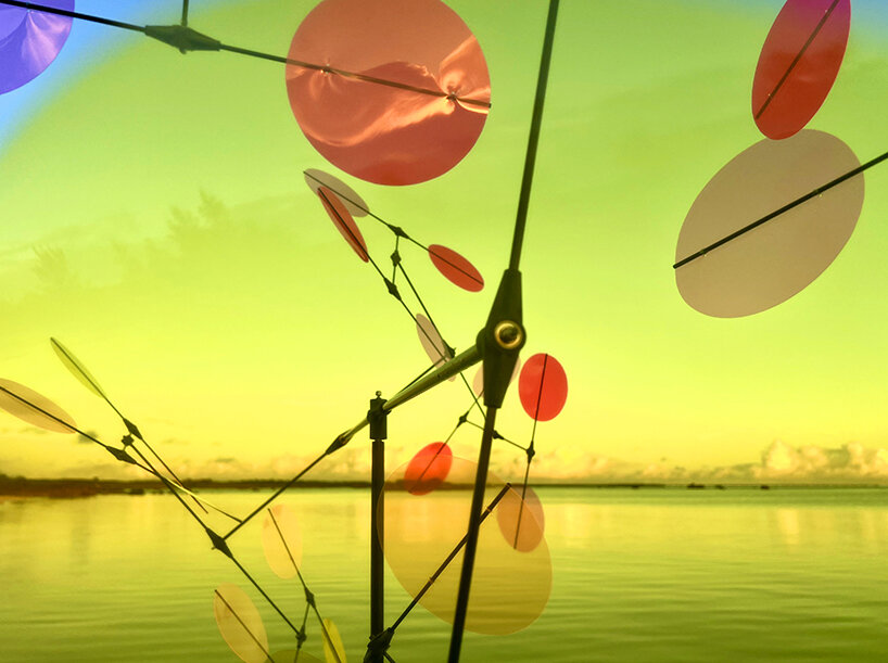 vincent leroy's multicolored installation turns japanese beach into chromatic landscape