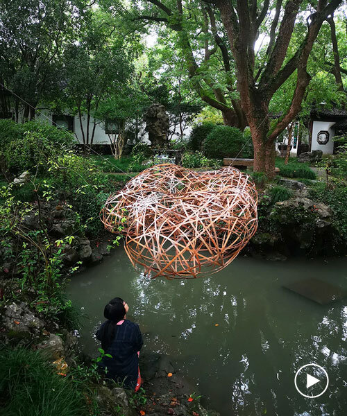 bamboo-weaved cloud installation floats above three traditional chinese gardens