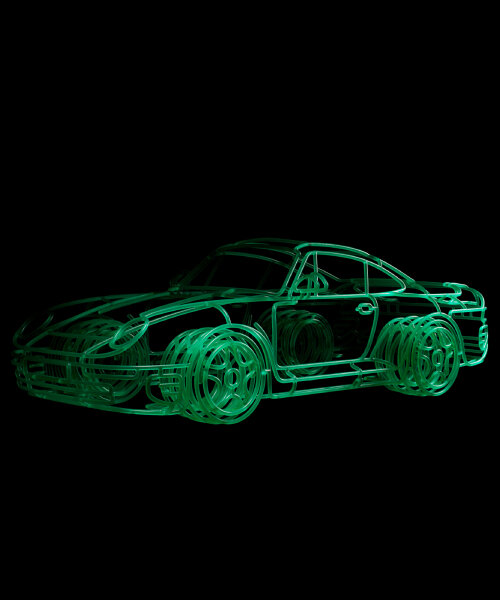 benedict radcliffe and INK reshape porsche 959 car into glowing steel tube sculptures