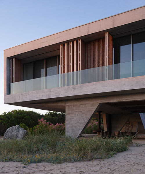 casa la secreta: grimaldi - nacht arquitectos lightly perches concrete home on uruguay coast