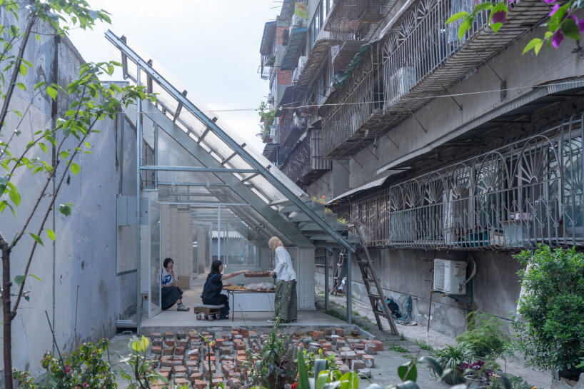 YIIIE turns abandoned bicycle shed into community recycling space in china