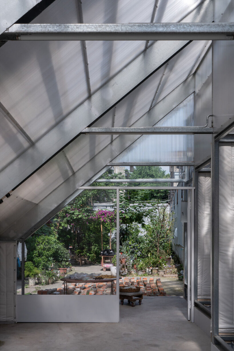 YIIIE turns abandoned bicycle shed into community recycling space in china