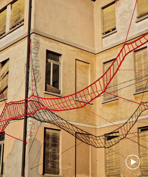 la cura threaded installation by ECO weaves across neglected elementary school in italy