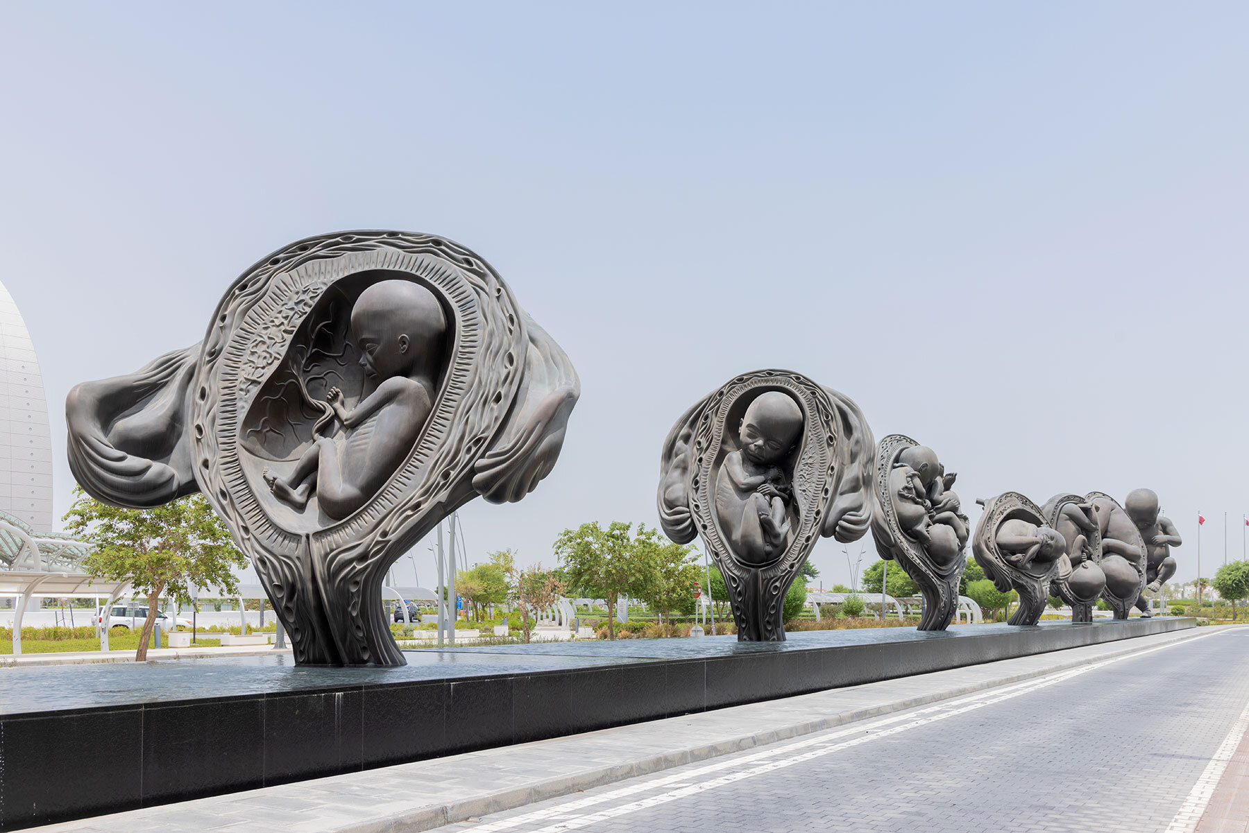 exploring qatar's public art, from towering desert monuments to bold urban sculptures