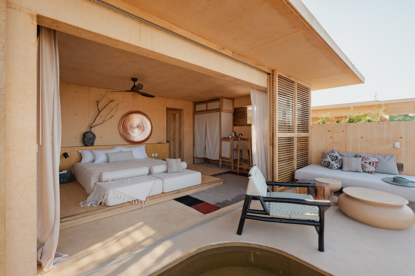 kymaia hotel's sandy, stepping suites emerge from coast of puerto escondido, mexico