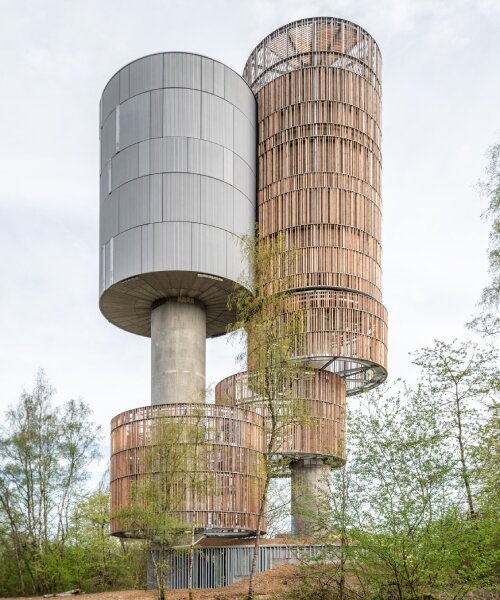 wood and cork towers create water reservoir and wildlife shelter in luxembourg forest