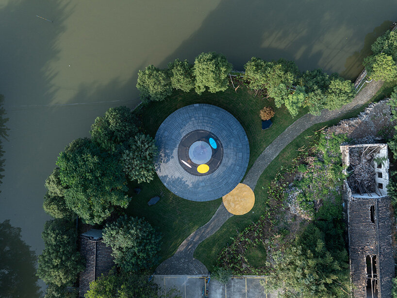 MAD architects honors childhood with flying saucer-like installation at chinese art festival